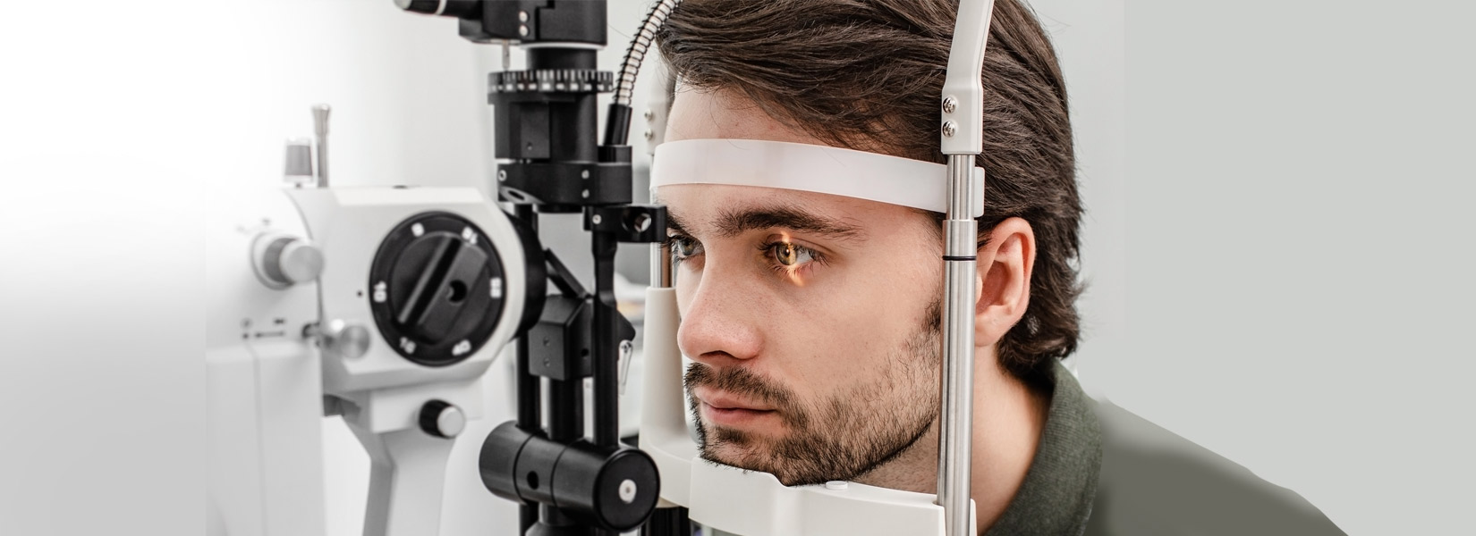 young man during eye exam in Cottage Grove